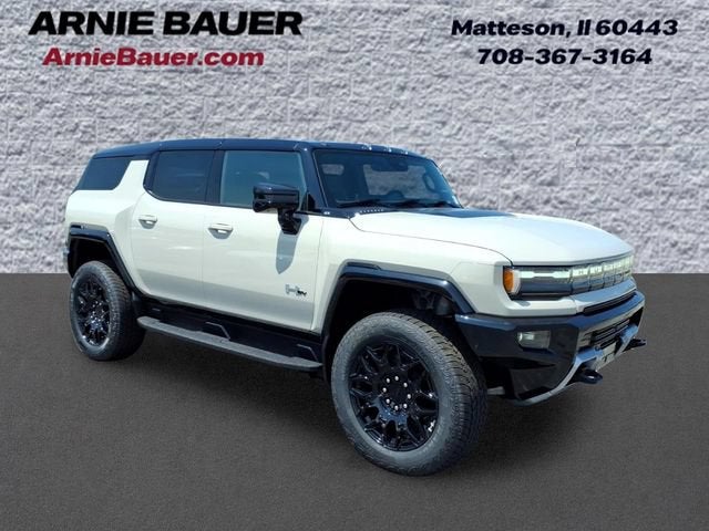 2026 GMC HUMMER EV SUV 2X in Coastal Dune — front three-quarter view