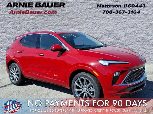2026 Buick Encore GX Avenir in Brilliant Red — front three-quarter view